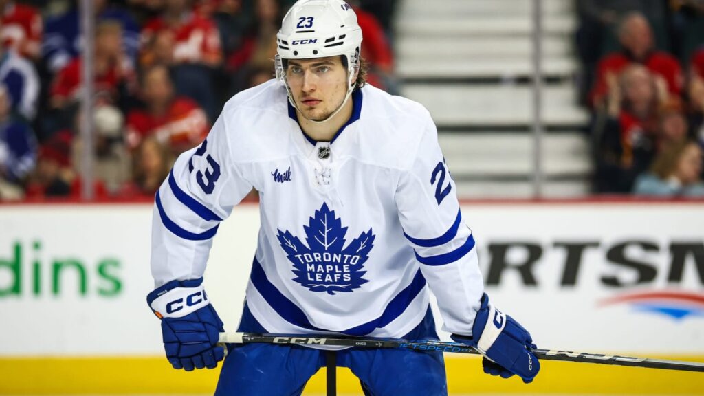 Maple Leafs’ Matthew Knies fights Golden Knights’ Zach Whitecloud after opening faceoff